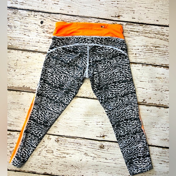 Nike Women’s XS leggings. Zebra print with neon orange accents.Brand new w/o tag - Picture 2 of 7